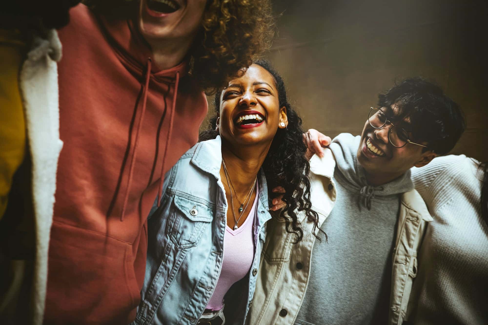 Happy young people laughing together